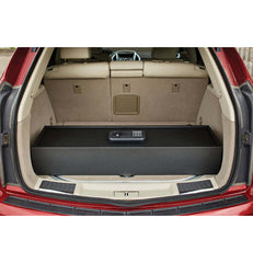 SnapSafe Trunk Safe II securely stored in an SUV trunk, showcasing its large storage capacity and heavy-duty design.